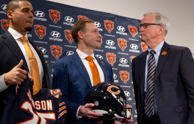 New Chicago Bears coach Ben Johnson speaks with chairman George McCaskey after being introduced Wednesday, Jan. 22, 2025, at Halas Hall. (Brian Cassella/Chicago Tribune)