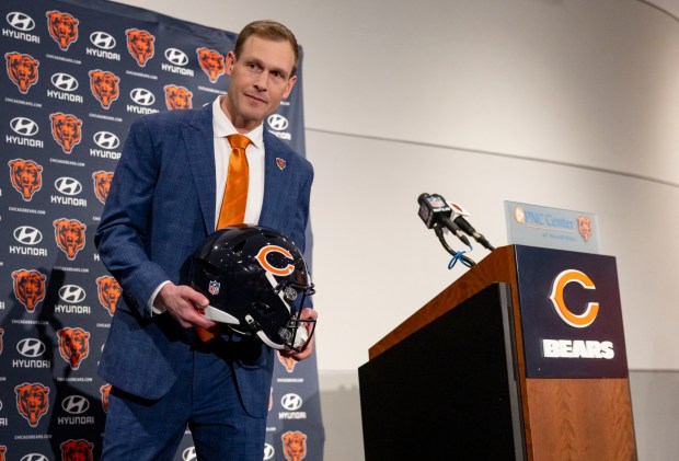 New Chicago Bears coach Ben Johnson holds a helmet after being introduced Wednesday, Jan. 22, 2025, at Halas Hall. (Brian Cassella/Chicago Tribune)