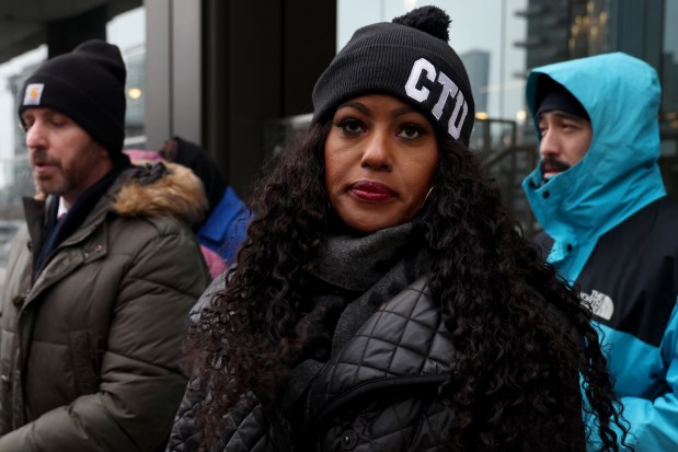 Chicago Teachers Union President Stacy Davis Gates listens to speakers answering reporters' questions during a news conference on Jan. 22, 2025. The CTU and Chicago Public Schools have brought in an arbitrator to try to help resolve the contract dispute. (Antonio Perez/Chicago Tribune)