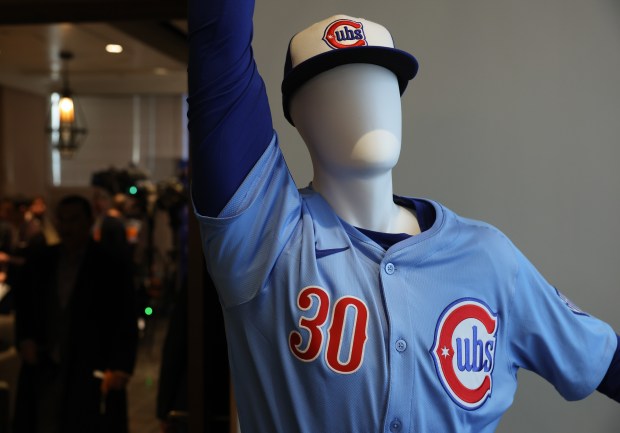 A mannequin dressed in a new Cubs alternate jersey is on display before players gather for a social hour at the Loews Chicago Downtown Hotel leading up to the opening ceremony for the Cubs Convention at the Sheraton Grand Chicago Riverwalk on Jan. 17, 2025. (John J. Kim/Chicago Tribune)