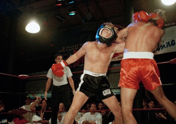 Danny Bonaduce, left, and Donny Osmond duke it out during a fight in Chicago, Jan. 17, 1994. Osmond, who stars in the production of "Joseph and the Amazing Technicolor Dreamcoat" and Bonaduce, who is a disc jockey for a Chicago radio station, met in the ring for three rounds. Bonaduce took a 2-1 decision. (AP Photo/Tim Boyle)