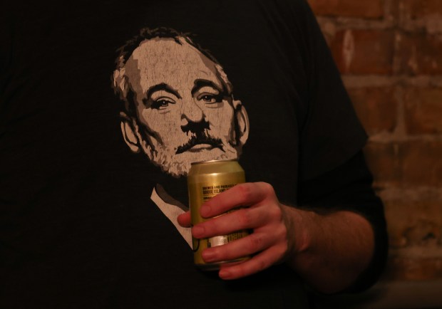 A concertgoer wears a shirt with a drawing of Bill Murray before a performance by Bill Murray and His Blood Brothers at Thalia Hall Friday, Jan. 3, 2025, in Chicago. (John J. Kim/Chicago Tribune)