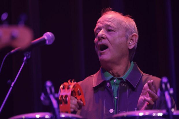 Bill Murray plays backup percussions in performance with the band Bill Murray and His Blood Brothers at Thalia Hall Friday, Jan. 3, 2025, in Chicago. (John J. Kim/Chicago Tribune)