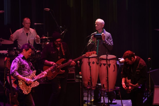 Bill Murray plays backup percussions in performance with the band Bill Murray and His Blood Brothers at Thalia Hall Friday, Jan. 3, 2025, in Chicago. (John J. Kim/Chicago Tribune)