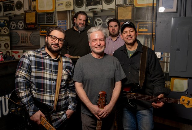 Ted Sofios, left to right, Michael Ressler, Jonathan Salem Baskin, Andrew Hollander-Urbach and Todd Rowan of Mortal Fools, a local band that performs rock versions of literary works by Shakespeare and Milton, on Jan. 5, 2025, at Fort Knox Studios before a show adapting Homer's Odyssey. (Brian Cassella/Chicago Tribune)