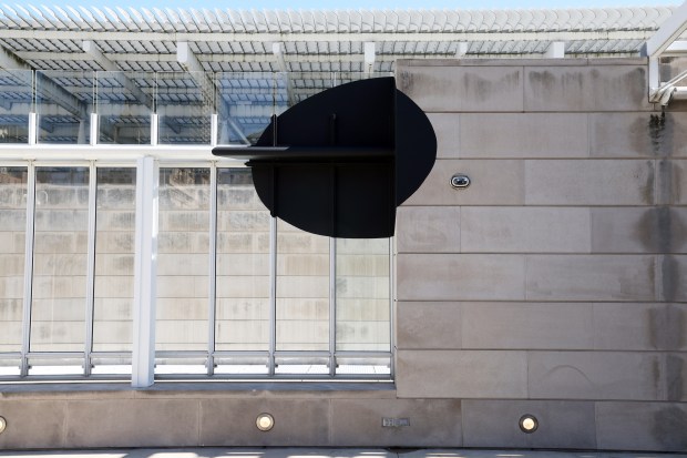 Part of "Nancy Holt: Seeing in the Round" at The Art Institute of Chicago. A distorted shape on the wall, when viewed through a nearby metal tube, looks like a perfect circle. (Terrence Antonio James/Chicago Tribune)