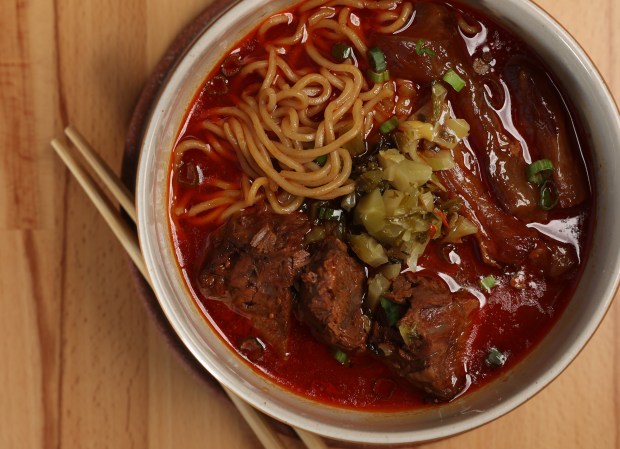 The Niuroumian beef noodle soup with half beef and half tendon is on the lunch and dinner menu at Minyoli. (John J. Kim/Chicago Tribune)