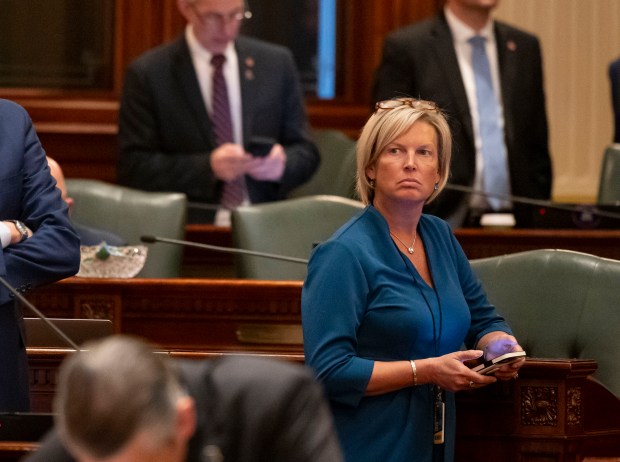 State Rep. Tony McCombie, who is the Republican leader, and other Republicans listen to debate on the House floor on Jan. 7, 2025, at the Illinois State Capitol in Springfield. (Brian Cassella/Chicago Tribune)