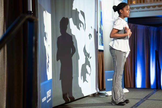 Samira Howard, of Boys and Girls Clubs of Chicago, performs her speech during a competition against nine other fourth- and fifth-grade students from Chicago Public Schools and the Boys & Girls Clubs of Chicago during Lardner LLP's Annual MLK Jr. Oratory Competition at The Drake Hotel. (Audrey Richardson/Chicago Tribune)