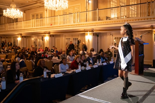 Mackenzie James, of Lenart Elementary, makes her speech while competing for the top honor at Foley & Lardner LLP's Annual MLK Jr. Oratory Competition at The Drake Hotel on 17, 2025. (Audrey Richardson/Chicago Tribune)