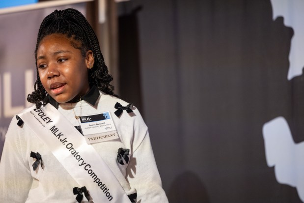 Tamia Bennett, of Joseph Warren Elementary, makes her speech while competing for the top honor at Foley & Lardner LLP's Annual MLK Jr. Oratory Competition on Jan. 17, 2025. (Audrey Richardson/Chicago Tribune)