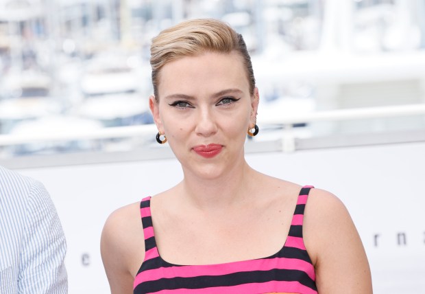 Scarlett Johansson poses for photographers at the photo call for the film "Asteroid City" at the 76th Cannes Film Festival, May 24, 2023. OpenAI plans to halt the use of one of its ChatGPT voices after some drew similarities to Johansson, who famously portrayed a fictional AI assistant in the film "Her." (Joel C Ryan/Invision/AP)