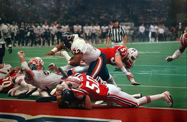 The Bears' William Perry (72) plows into the end zone on a 1-yard touchdown run during Super Bowl XX on Jan. 26, 1986. (Ed Wagner Jr./Chicago Tribune)