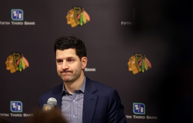 Blackhawks general manager Kyle Davidson speaks with the media after the firing of coach Luke Richardson and the promotion of interim coach Anders Sorensen on Dec. 6, 2024, at Fifth Third Arena. (Stacey Wescott/Chicago Tribune)