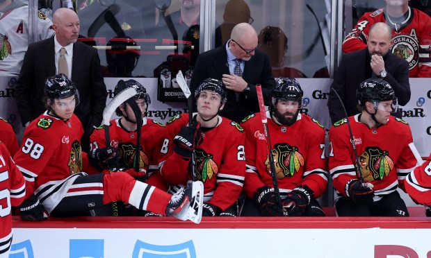 Blackhawks interim coach Anders Sorensen, top right, looks on from the bench against the Oilers on Jan. 11, 2025, at the United Center. (Chris Sweda/Chicago Tribune)