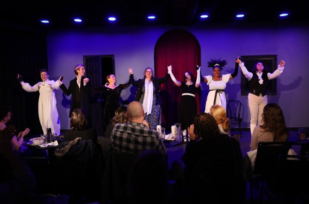 The cast of "Improvised Jane Austen" take a bow following their performance at iO Theater in Chicago on Dec. 7, 2024. (Chris Sweda/Chicago Tribune)