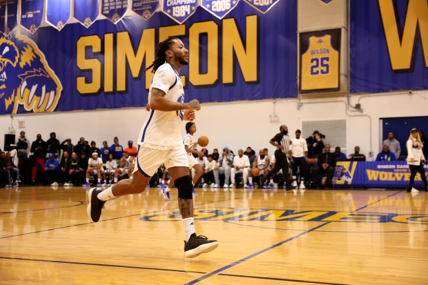 Derrick Rose plays in a game as he is honored at Simeon Career Academy in Chicago on Friday, Jan. 3, 2025. The Simeon graduate and former Chicago Bulls superstar is being honored at the United Center on Saturday night during a Bulls vs. New York Knicks game. (Chris Sweda/Chicago Tribune)