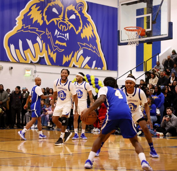 Derrick Rose (second from left) plays in a game as he is honored at Simeon Career Academy in Chicago on Friday, Jan. 3, 2025. The Simeon graduate and former Chicago Bulls superstar is being honored at the United Center on Saturday night during a Bulls vs. New York Knicks game. (Chris Sweda/Chicago Tribune)