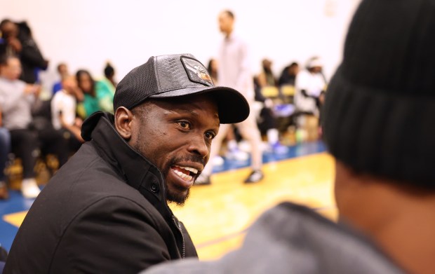 Luol Deng, a former Chicago Bulls player and teammate of Derrick Rose, hangs out at Simeon Career Academy in Chicago during a game and ceremony honoring Rose on Friday, Jan. 3, 2025. Rose, the Simeon graduate and former Chicago Bulls superstar is being honored at the United Center on Saturday night during a Bulls vs. New York Knicks game. (Chris Sweda/Chicago Tribune)