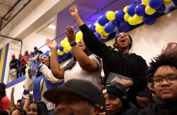 People in the stands cheer as Derrick Rose participates in a game with youths at Simeon Career Academy in Chicago on Friday, Jan. 3, 2025. The Simeon graduate and former Chicago Bulls superstar was honored after the game and will be honored again at the United Center on Saturday night during a Bulls vs. New York Knicks game. (Chris Sweda/Chicago Tribune)