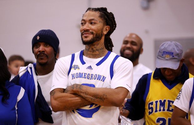 Derrick Rose stands by as he is honored after a game with youths at Simeon Career Academy in Chicago on Friday, Jan. 3, 2025. The Simeon graduate and former Chicago Bulls superstar is being honored at the United Center on Saturday night during a Bulls vs. New York Knicks game. (Chris Sweda/Chicago Tribune)