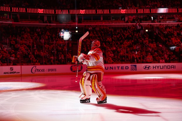 Calgary Flames goaltender Dustin Wolf (32) skates on the ice before the first period against the Chicago Blackhawks at the United Center Monday Jan. 13, 2025, in Chicago. (Armando L. Sanchez/Chicago Tribune)