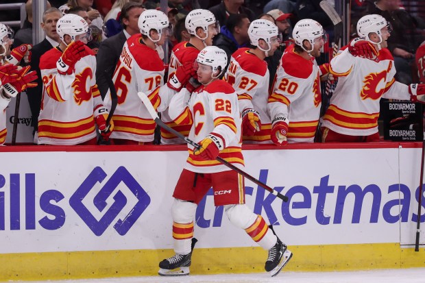 Calgary Flames left wing Jakob Pelletier (22) celebrates after scoring the first goal during the first period against the Chicago Blackhawks at the United Center Monday Jan. 13, 2025, in Chicago. (Armando L. Sanchez/Chicago Tribune)