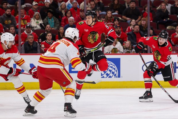 Chicago Blackhawks center Connor Bedard (98) jumps in the air during the first period against the Calgary Flames at the United Center Monday Jan. 13, 2025, in Chicago. (Armando L. Sanchez/Chicago Tribune)