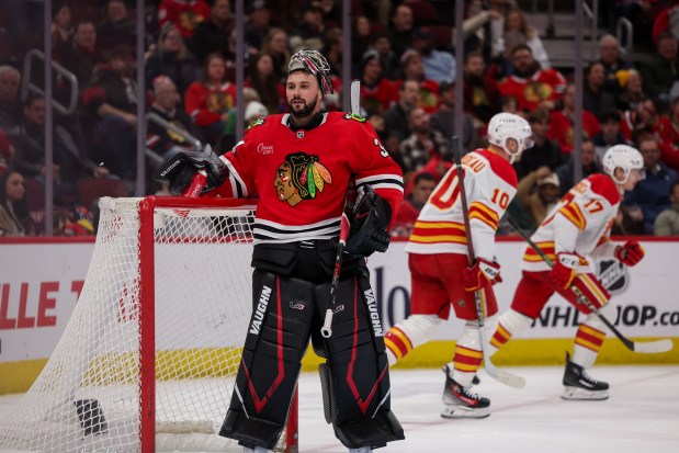 Chicago Blackhawks goaltender Petr Mrazek (34) takes drink of water after Calgary Flames center Yegor Sharangovich (17) scored a goal during the second period at the United Center Monday Jan. 13, 2025, in Chicago. (Armando L. Sanchez/Chicago Tribune)