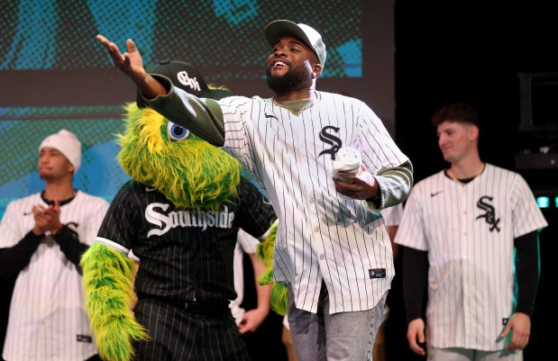 Chicago White Sox player Bryan Ramos tosses t-shirts into the audience during day 2 of SoxFest at the Ramova Theatre in Chicago's Bridgeport neighborhood on Saturday, Jan. 25, 2025. (Chris Sweda/Chicago Tribune)