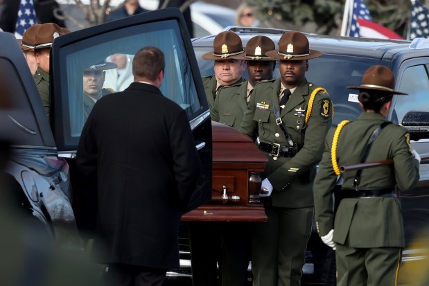 Illinois state trooper pallbearers carry the casket following the funeral for Trooper Clay Carns at Parkview Christian Church in Orland Park, Jan. 3, 2025. (Antonio Perez/Chicago Tribune)