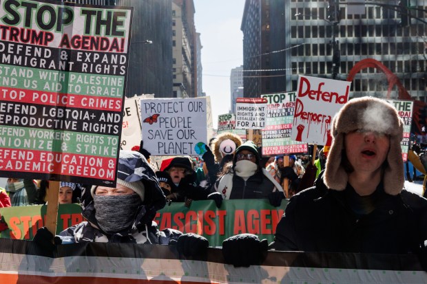 Anti-Trump activists march in Chicago's Loop Jan. 20, 2025. (Armando L. Sanchez/Chicago Tribune)