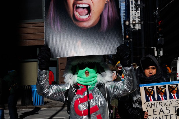 Anti-Trump activists protest in Chicago's Loop on Jan. 20, 2025. (Armando L. Sanchez/Chicago Tribune)