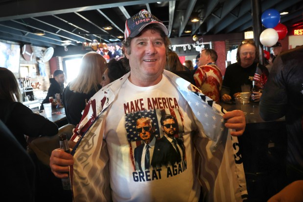 Joe Leyden, shows his support during a Donald Trump inauguration watch party at Danny's Pizza Place in Chicago, Jan. 20, 2025. He was arrested in the Jan. 6 Capitol attack and sentenced to six months behind bars. His Brother Daniel Leyden was also arrested and was sentenced to more than three years in federal prison. (Antonio Perez/Chicago Tribune)