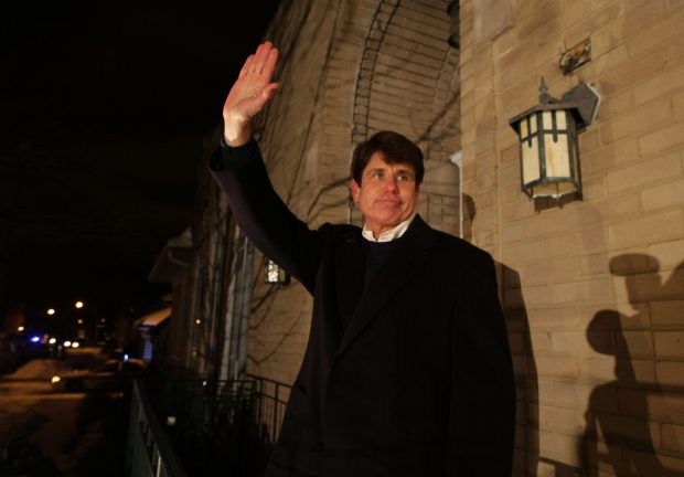 Former Illinois Gov. Rod Blagojevich waves to supporters outside his home on Jan. 29, 2009, in Chicago. Gov. Pat Quinn was sworn in after the Senate voted 59-0 to remove Blagojevich from office. (Terrence Antonio James/Chicago Tribune) 