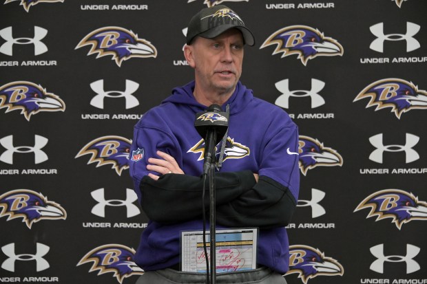 Baltimore Ravens offensive coordinator Todd Monken takes questions after practice Thursday ahead of Sunday's divisional round playoff game against the Buffalo Bills. (Kim Hairston/Staff)