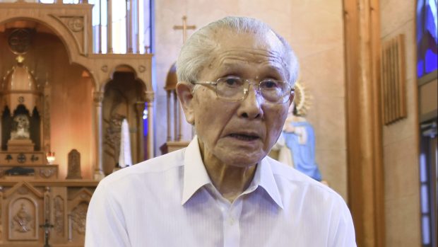 FILE - Shigemi Fukahori is interviewed at the Urakami Cathedral in Nagasaki, southern Japan, on July 29, 2020. Shigemi Fukahori, a survivor of the 1945 Nagasaki atomic bombing, who devoted his life to praying for peace and the souls of the victims, has died. He was 93. (Kyodo News via AP, File)