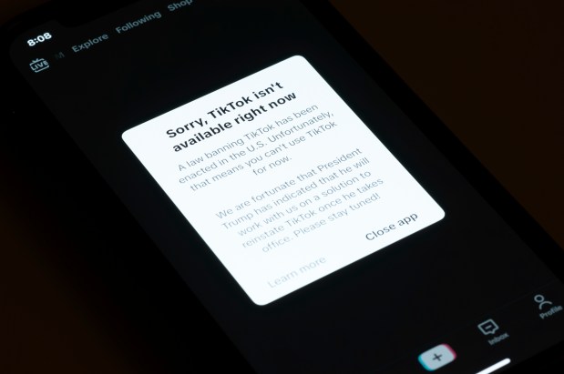 A message reading "Sorry, TikTok isn't available right now" is displayed from the TikTok app on a cell phone screen on Jan. 18, 2025, in Los Angeles. (AP Photo/Andy Bao)