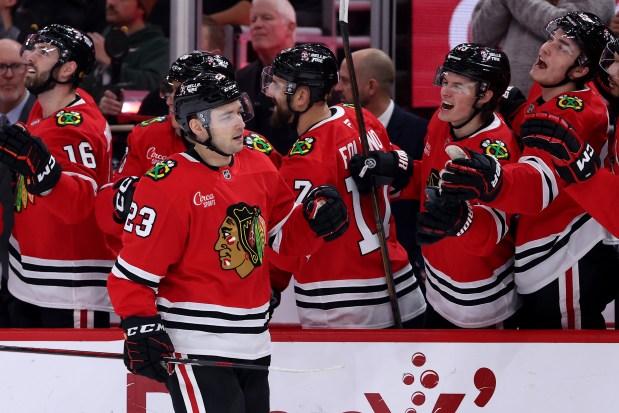 Philipp Kurashev #23 of the Chicago Blackhawks celebrates a goal with teammates against the Carolina Hurricanes during the first period at the United Center on Jan. 20, 2025 in Chicago, Illinois. (Photo by Luke Hales/Getty Images)