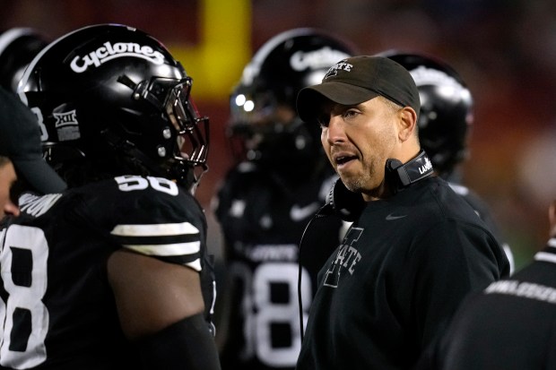 Iowa State head coach Matt Campbell stands on the sideline during the first half of an NCAA college football game against Cincinnati, Saturday, Nov. 16, 2024, in Ames, Iowa. (AP Photo/Charlie Neibergall)