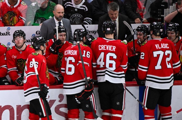 Blackhawks interim coach Anders Sorenson, top left, directs his team during the third period against the Lightning on Jan. 24, 2025, at the United Center. (Matt Marton/AP)