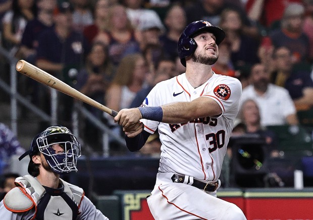 Astros slugger Kyle Tucker hits a home run against the Tigers on April 5, 2023, at Minute Maid Park in Houston. (Bob Levey/Getty)