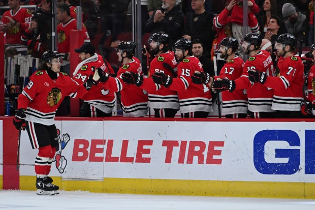 The Blackhawks' Tyler Bertuzzi (59) celebrates with teammates after scoring against Rangers on Jan. 5, 2025, at the United Center. (Paul Beaty/AP)