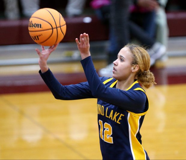 Round Lake's Emma Franks (12), taking a shot, during the game on Monday, Jan. 27, 2024, in Zion. (Mark Ukena/for the Lake County News-Sun)