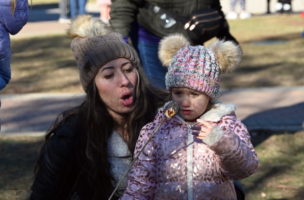 Check out the small flame on the marshmallow. Ready to blow out the fire together are parent Jazmin Halvorsen of Kenosha, Wisconsin and daughter Leighton Halvorsen, 3, at Frosty Fest on Jan. 4, 2025 at Viking Park (4374 Old Grand Ave.) in Gurnee. (Karie Angell Luc/Lake County News-Sun)