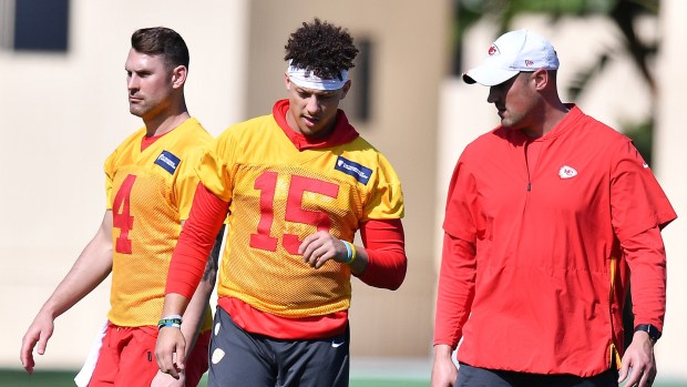 Chiefs quarterbacks coach Mike Kafka, a St. Rita graduate, talks with quarterback Patrick Mahomes during practice on Jan. 29, 2020, in Davie, Fla.