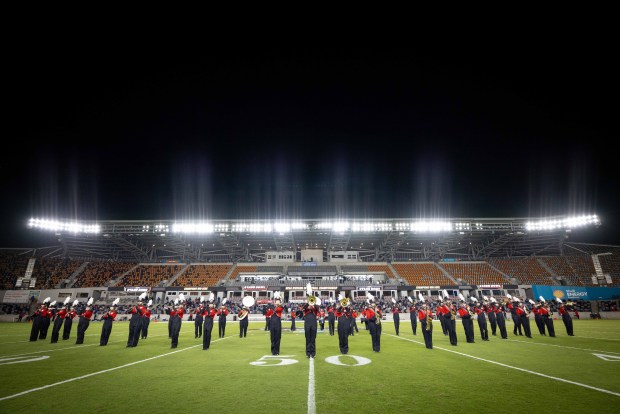 The North Central College Cardinal Marching Band performs at half-time of the Stagg Bow, the NCAA Division III national championship game, in Houston on Sunday, Jn. 5, 2025. (Susan Chou)