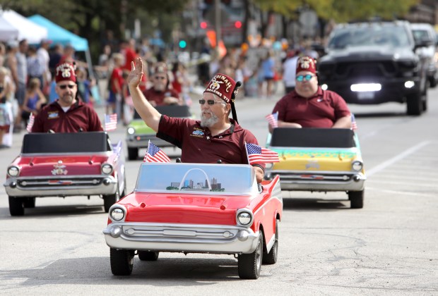 DuPage Shrine Club members drive little cars Sept. 18, 2021, during the La Grange Pet Parade. (James C. Svehla-Pioneer Press)