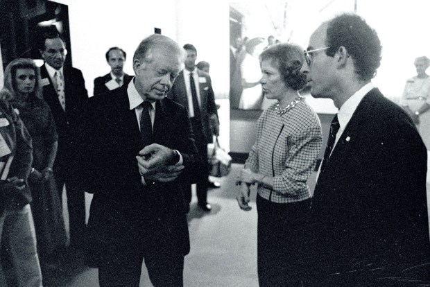 President Jimmy Carter, Rosalynn Carter and Rick Jasculca share a moment at The Carter Center in Atlanta during an event associated with the 1988 Democratic Convention. Jasculca worked with the Carters off and on for half a century, and over time the two families became friends. (Joe Reilly)