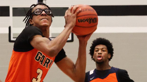 West Side's Derek Collins (3) looks to the hoop as he lays up a shot against Hammond Central during a Great Lakes Athletic Conference basketball game in Hammond on Friday, Dec. 13, 2024. (John Smierciak / Post Tribune)